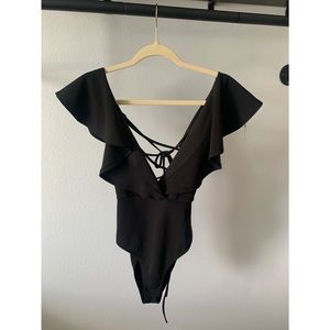 Deep plunge bodysuit with laced-up back - never used!